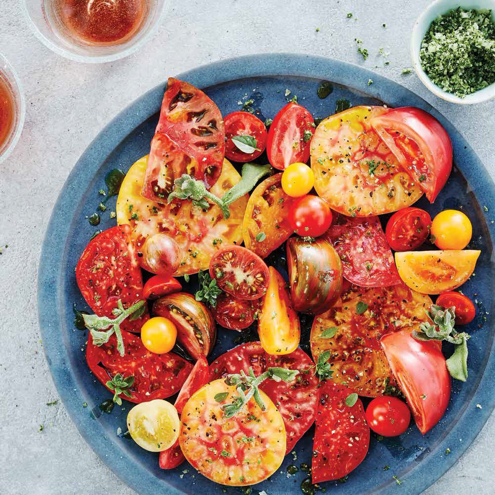 A bowl of heirloom Tomatoes with Basil Salt & Ice Lettuce